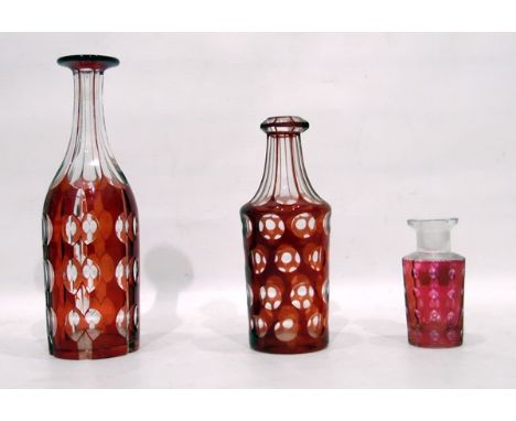 Ruby overlay cut glass decanter, another (missing stopper) and a ruby overlay miniature decanter (3) 