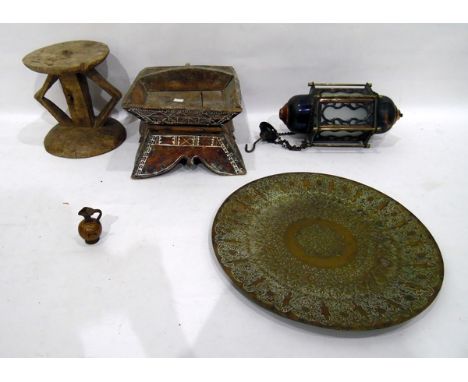 Middle Eastern circular metal tray, a ceiling hanging lantern, a carved wooden pedestal (possibly African) and a wooden tray 