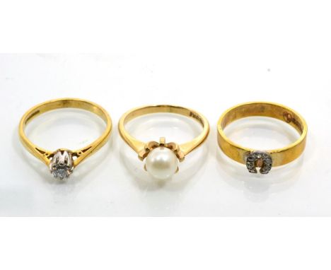 A 9 carat gold diamond horseshoe ring, a white gold horseshoe set with eight-cut diamonds, to a yellow gold band, finger size