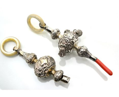 An Edwardian silver child's rattle with coral teether; and another silver whistle with, mother-of-pearl ring (2)