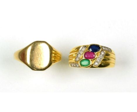 A multi-gemstone and diamond ring, an oval cut sapphire, ruby and emerald in rubbed over settings, with pave set brilliant cu