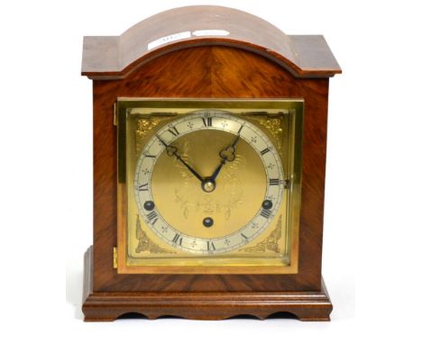 A mahogany cased Elliott chiming table clock