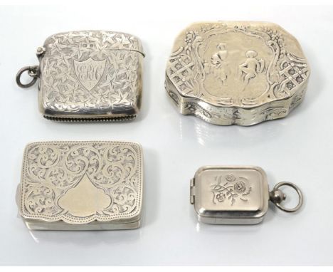 A silver vesta case, Birmingham 1909, with foliate engraving; a silver snuff box, Adie & Lovekin, Birmingham 1910; a Contient