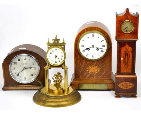 An inlaid striking mantel clock, a miniature longcase clock mantel timepiece, 1930's mantel clock and an anniversary mantel t