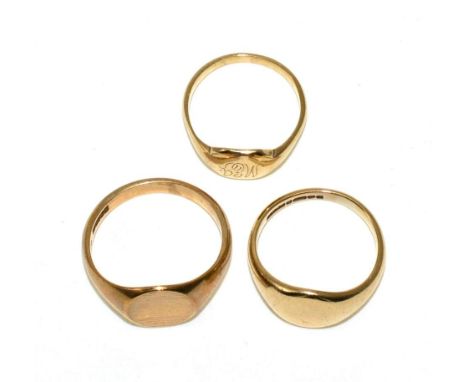 Two 9 carat gold signet rings and another signet ring, finger size P1/2, L and J1/2 (3)9.9g gross