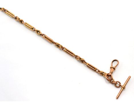 A 9 carat gold fancy link Albert, of long and knot links, with T-bar, clip and spring ring, length 36cm33.1g