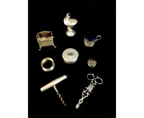 A group of Georgian and later silver items, comprising A late 19th century silver salt of elaborate design, topped with a boy