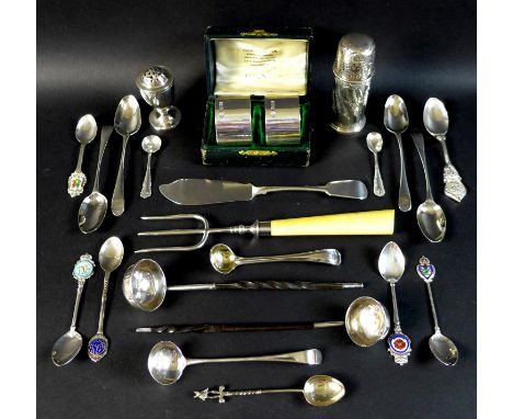 A collection of silver items, including a pepper pot with pricked decoration and spiral worked body, Horace Woodward &amp; Co