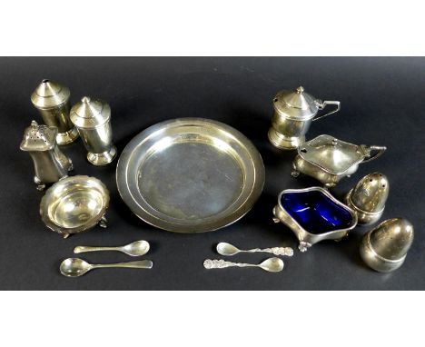 A group of cruet sets, comprising a set of Art Deco design with stepped conical tops, comprising salt, pepper mustard pot wit