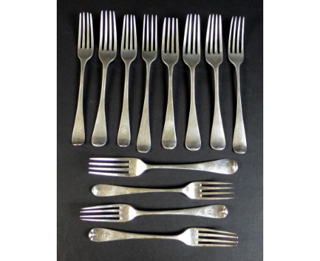 Twelve George III and later old English pattern silver dessert forks, five George III Hanoverian pattern forks with engraved 