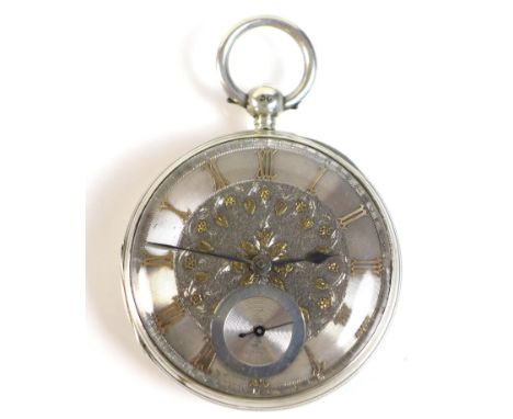 A Victorian silver open faced pocket watch, silvered face with engine turned chapter ring set with gilded Roman numerals with