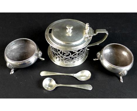 A collection of Victorian and later silver cruet wares, comprising a Victorian single handled circular form mustard pot with 
