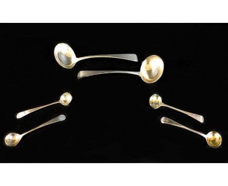 A group of George III silver spoons, all Old English pattern, comprising a sauce ladle, with engraved terminal, WE possibly f