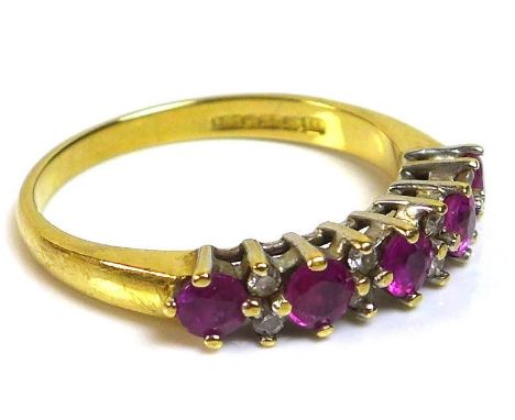 An 18ct gold ruby and diamond half eternity ring, set with five rubies interspersed with four pairs of diamonds, size N, tota