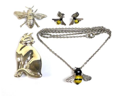 A collection of Sarah Jones of London silver jewellery, comprising a seated cat, 1988, a large silver bee pendant 1990, and a
