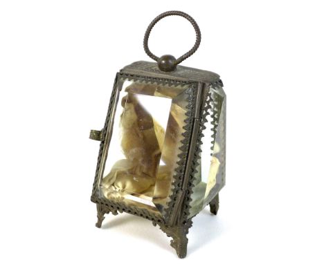 A French early 20th century brass pocket watch display case, with bevelled glass sides and to hinged front, twist loop to top