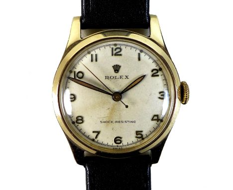 A vintage Rolex Shock-Resisting 9ct gold cased gentleman's wristwatch, circa 1950s, ref. 12325, circular champagne dial with 