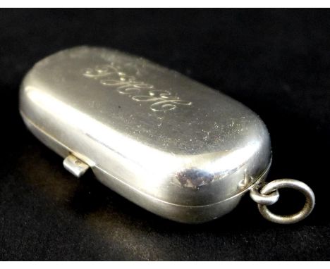 A George V silver sovereign case, of plain oblong form with hinged cover engraved 'JHH', two sprung compartments for ten coin