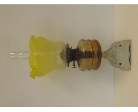 Victorian oil lamp with cast iron base, finely etched glass shade 