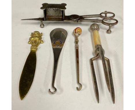 A Georgian candle snuffer; three prong fork; two button hooks; a Loncoln Imp letter opener