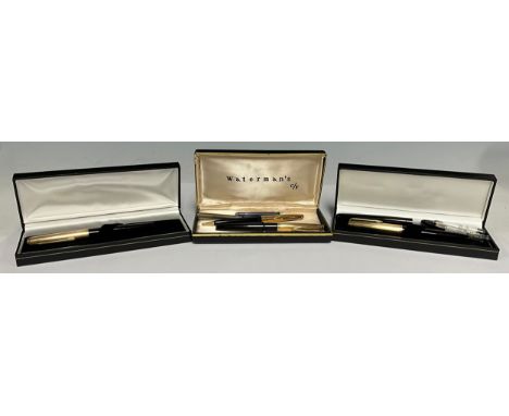 A Waterman rolled gold fountain pen and mechanical pencil set, push close cap, 14ct nib, cased; a DP2 fountain pen, rolled go