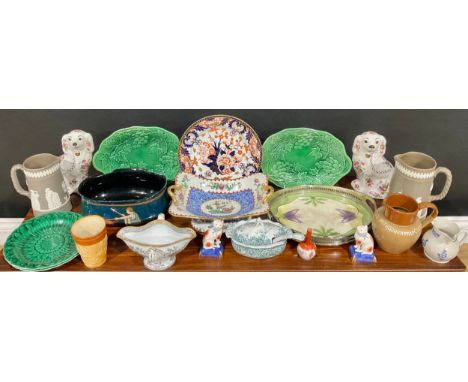 A Decoro oval jardiniere, decorated with classical boar hunting scene, 26cm wide; majolica leaf plates; a Cadbury stoneware a