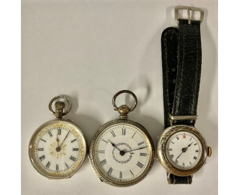 Watches - an Edwardian silver wristwatch, circular silver trench case, white dial, black Roman numerals with red 12 position,