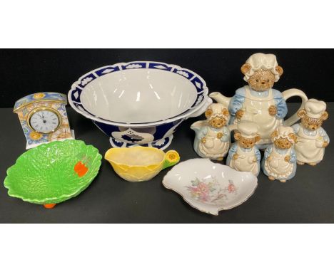 A Royal Crown Derby blue and white unfinished punchbowl; a Royal Doulton Millennium clock; a Royal Doulton trinket dish; a Ja