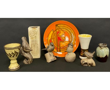 A Poole Delphis circular plate, 25.5cm diameter, monogrammed; Poole bird models; a Tolcarne type four sided vase, 21cm high; 