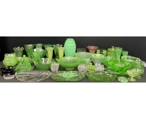 An assortment of 1930s and later uranium and green cut class, comprising vases, beauty sets, trinket dishes, etc (qty)
