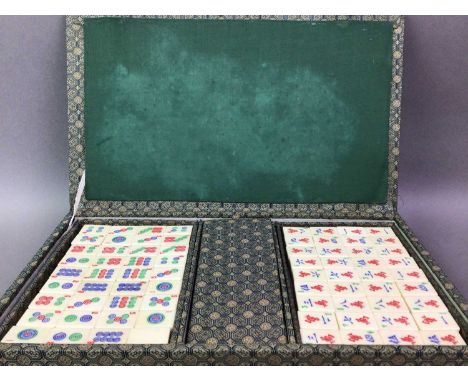 MAHJONG SET in caseImage of items in Central section now online. The tiles are made of bone with bamboo backs.