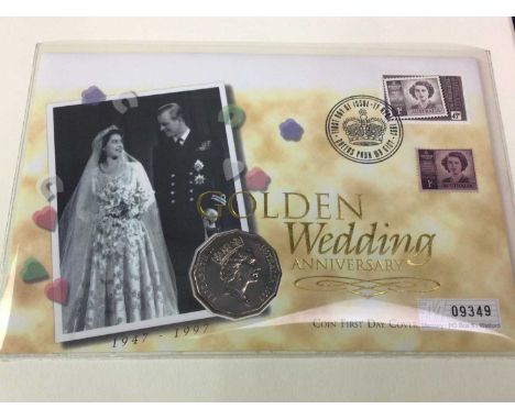COLLECTION OF FIRST DAY COVERS CONTAINED IN TWO ALBUMS comprising the history of WWII and the royal familyQty: 2