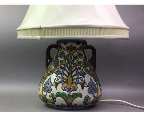 STUDIO POTTERY LAMP OF ART NOUVEAU DESIGN with two monograms to base30cm high to sconce