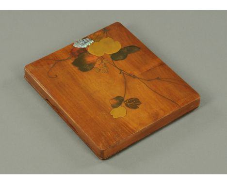 A Japanese Suzuribako (writing box), late 19th century, simply decorated with gilt, lacquered and mother of pearl leaves and 
