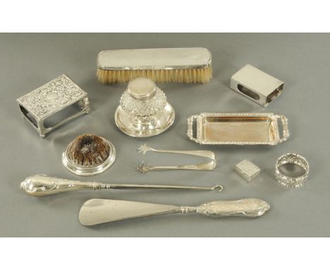 A silver mounted pen wiper, Chester 1903, small silver pin tray, Birmingham 1998, chased silver matchbox holder, small silver