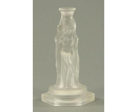 An Art Deco moulded glass candlestick, classical nudes.  Height 23.5 cm.    CONDITION REPORT:  This is more likely to have be