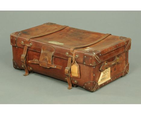 A Vintage brown leather travel trunk by R.W. Forsyth Limited, makers Glasgow and Edinburgh, interior with cloth bound removab