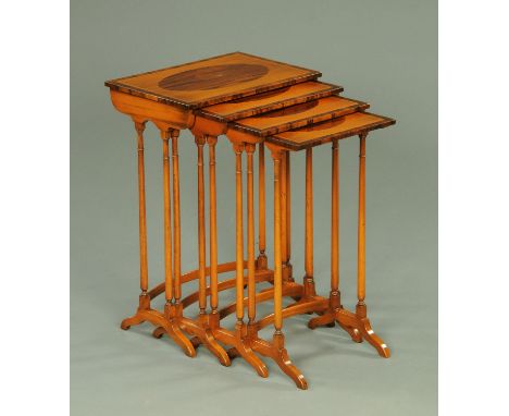A quartetto of satinwood rosewood boxwood and ebony strung tables, each raised on ring turned legs with downswept feet.  Larg