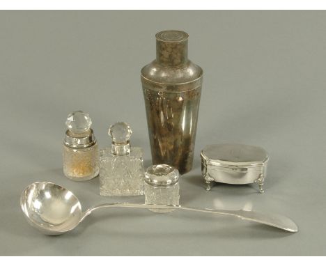 Three silver mounted dressing table accessories, a silver casket, plated cocktail shaker and plated ladle.