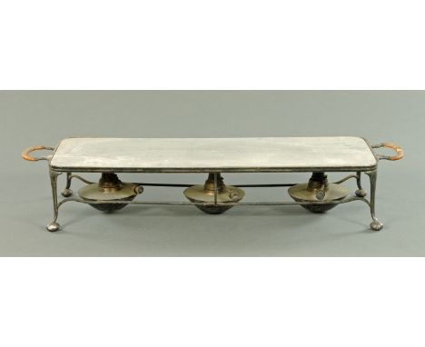 An Asprey & Co silver plated hot plate, late 19th century, the removable top stamped with a crown above Asprey London within 