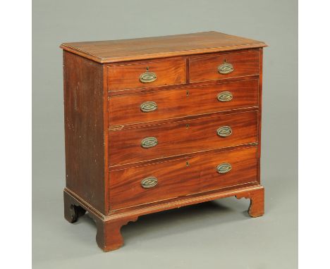 A George III mahogany chest of drawers, with applied moulded edge above two short and three long graduated drawers with brass