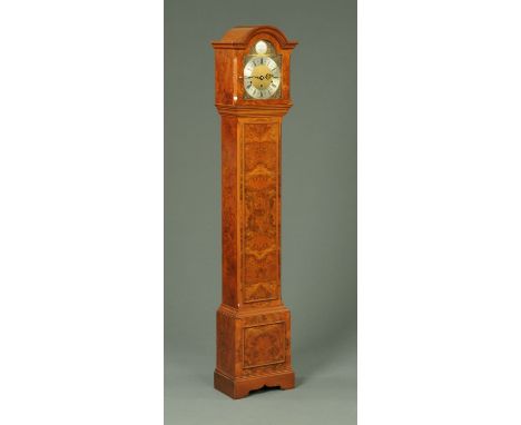 An Elliott of London grandmother clock, with walnut case and three-train spring driven movement, all raised on bracket feet. 