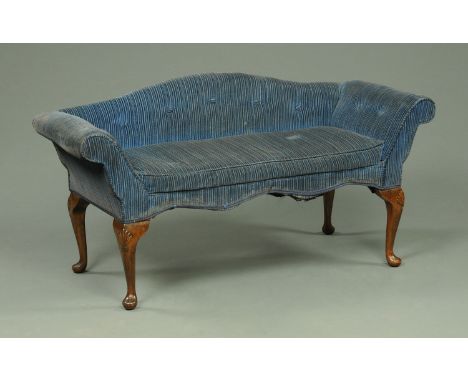 A small window seat, with arched deep button back, rollover ends and raised on four cabriole legs with shell carved knees ter