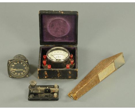 A vintage Russian aircraft instrument, a Morse Code sender, kaleidoscope and cased ammeter.   