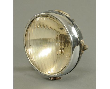 A Vintage H Miller and Co motorcycle headlamp, mid 20th Century, No. 832 and with ampere gauge inset to the top, glass diamet