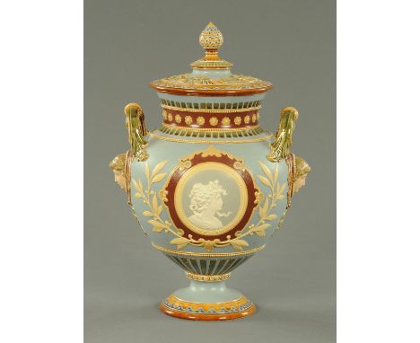 A large "Mettlach Majolica" covered vase, in the Neoclassical style, having signed medallions by M Hein of female cameo heads