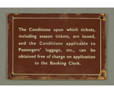 An original enamel railway sign, early 20th Century, "The conditions upon which tickets, including season tickets, are issued