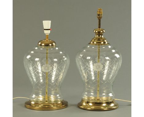 A pair of contemporary table lamps, brass mounted and with etched and cut glass bases.  Height excluding light fitting 36 cm.