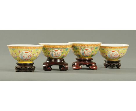 Two pairs of Chinese yellow ground tea bowls, early Republic period, one pair with a gilded Shou to the interior, the other w