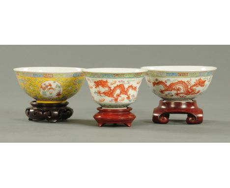 Three Chinese bowls, Republic period, two decorated with opposing dragons facing a flaming pearl amongst clouds and between a
